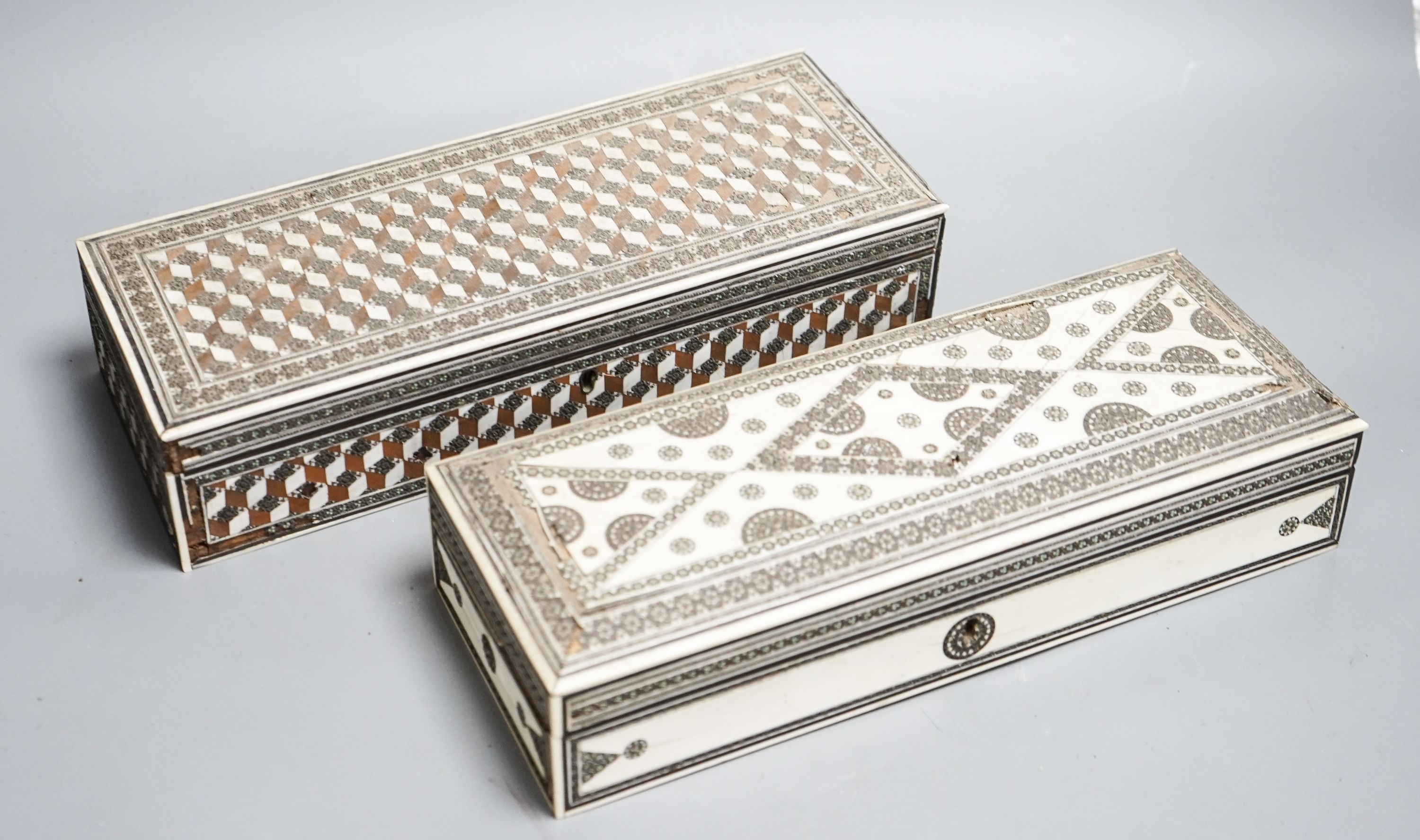 Two 19th century Indian ivory and sadeli work veneered sandalwood glove boxes (af)